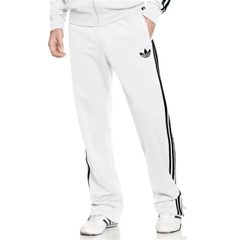 fake black and white adidas|black and white Adidas sweatpants.